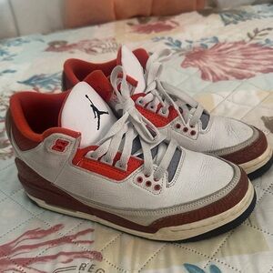 Jordan Black and Red Sole Sneakers